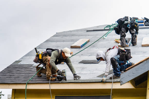 Professional Roofing technician working in Roslyn Heights, NY